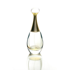 Almost empty perfume bottle isolated on white background with reflection.
