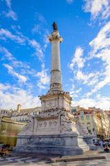 Fototapeta na wymiar It's Column of Pedro IV on Rossio Square (Pedro IV Square) in Lisbon, Portugal.