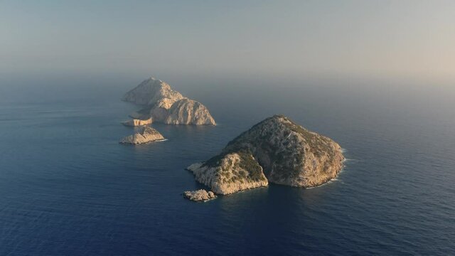 Desert Greek islands in the Mediterranean sea. Aerial Footafe 4K. Amazing landscape of Greece 