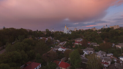 aerial city construction site near orthodox church at urban landmark