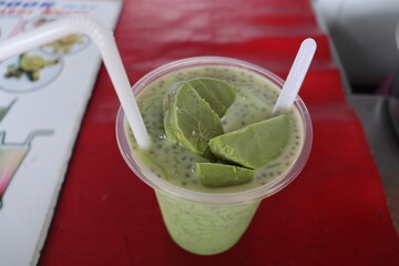 A glass full of traditional cold desert of India, Kulfi Falooda.