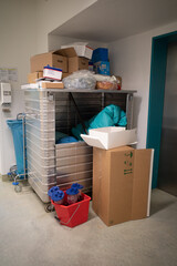 in a corner of a hospital hallway, the waste from the operating room