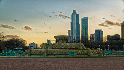 Millennium Park Chicago, Illinois,USA, with Buckingham Fountain at sunset with clouds in the sky