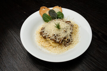 pasta Bolognese on white plate