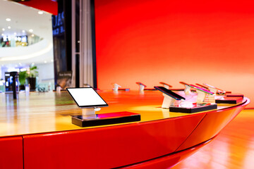 Demo smart phone and tablet on table for customes in phone shop