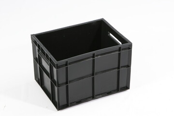 Black plastic box, container for storing and transferring fruits and vegetables, food, for storing things on a white background, online store
