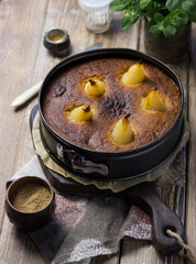 Chocolate pie cake with pear autumn homemade brownie traditional Christmas holiday baked pastry fudge dessert gourmet food on vintage wooden background table