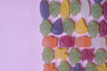 gelatine sweets of various shapes laid out in rows