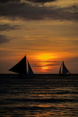 Sunset, white beach path, Boracay island, Philippines.