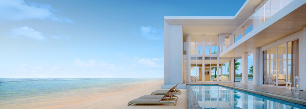 Sea view.Luxury modern beach house with swimming pool and sunbed  for vacation home or hotel.3d rendering