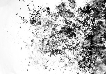 Black ink stains, dots, spatter and splashes on white paper background