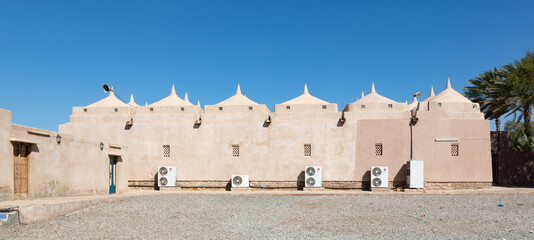 Al Hamouda Mosque with its profusion of numerous domes, located in town of Bani bu Ali in Oman