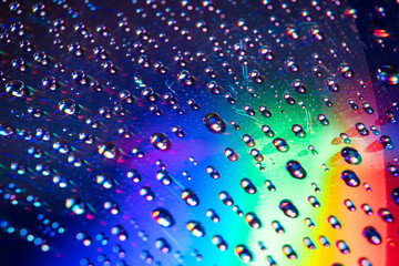 water drops on dvd media, water drops on colorful background