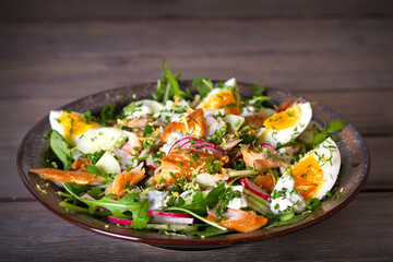 Smocked mackerel salad with eggs and radish. Healthy diet food