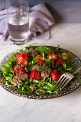 Chicken liver salad with strawberries