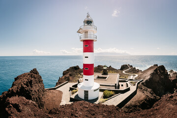 Lighthouse at Atlantic ocean coastline. Tenerife, Canary islands, Spain - 358846183