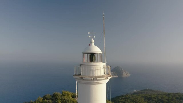 360 degree aerial close shot of lighthouse in Turkey.  Gelidonya lighthouse. Mediterranean sea. Drone footage 4K