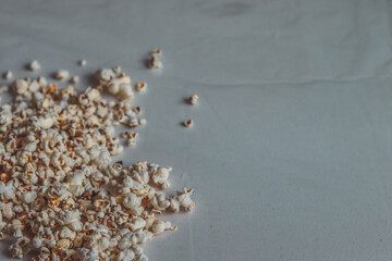 handful of popcorn  on a white background