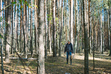 Mushroom picker in the forest