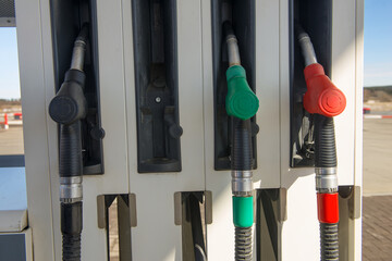 Gun for refueling at a gas station. Gasoline. Oil. Fuel Pump. Gas Station. Colorful Petrol pump...