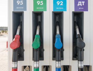 Gun for refueling at a gas station. Gasoline. Oil. Fuel Pump. Gas Station. Colorful Petrol pump...