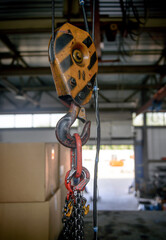 Steel hook and chain. Chain Hoist. Industrial hook hanging on reel chain
