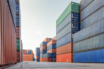 Fototapeta premium background Industrial Container Yard Prepare for exporting goods or storing products after importing concept,Stack of containers box, Cargo freight logistics business