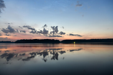 landscape with reflections in the river before dawn