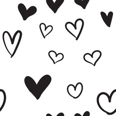 Hand drawn hearts seamless pattern. Texture background for valentine's day with heart doodles.