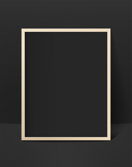 Black photo frame in black interior. Template for design