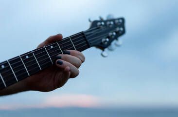 A man playing electric guitar stock photo