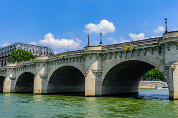 Fototapeta premium It's Pont Neuf, the oldest standing bridge across the river Seine in Paris, France.
