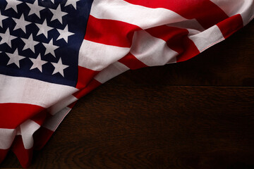 Retro american flyer, 4th of july background. Pride day flag. USA flag on wooden table