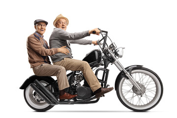Plakat Two elderly men riding a chopper motorbile and looking at the camera