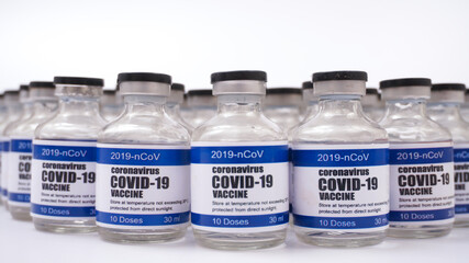 COVID-19 Corona Virus 2019-ncov Vaccine injection vials medicine drug bottles. Vaccination, immunization, testing, treatment to cure Covid-19 Corona Virus infection. Healthcare And Medical concept.