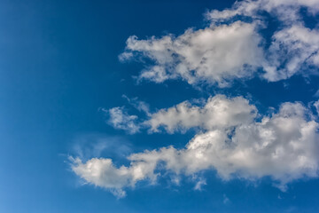 Naklejka na ściany i meble Sky with cloudscumulus clouds on clear blue sky before rain