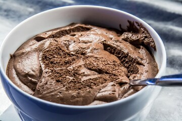 Closeup view of incredible chocolate mousse in cup.