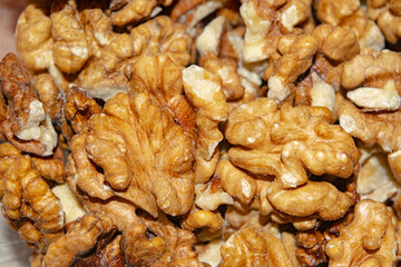 Peeled walnuts close-up. Surface texture. Healthy diet.