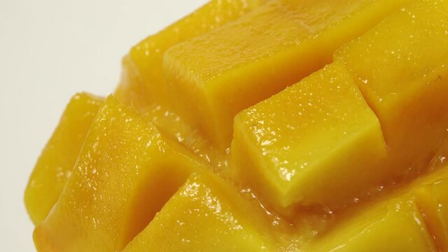 4K Sweet thai mango rotation of rip mango slice cubes cut