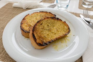 Bread toasted with garlic and oil