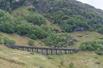 Stone railway bridge near Crianlarich, Scotland. Concept: Scottish railways, mysterious ancient...