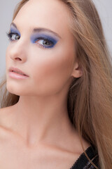 Obraz premium Young beautiful stylish girl posing in studio.