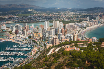 Obraz premium View of Calpe Calp town with Penon de Ifach mountain during the hiking to Penyal d'Ifac Natural Park, Marina Alta, province of Alicante, Valencian Community, Spain