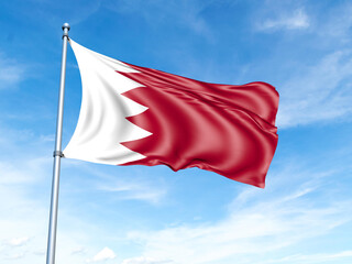 Bahrain flag on a pole against a blue sky background.