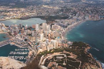 Fototapeta premium View of Calpe Calp town with Penon de Ifach mountain during the hiking to Penyal d'Ifac Natural Park, Marina Alta, province of Alicante, Valencian Community, Spain