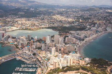 Fototapeta premium View of Calpe Calp town with Penon de Ifach mountain during the hiking to Penyal d'Ifac Natural Park, Marina Alta, province of Alicante, Valencian Community, Spain