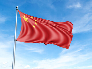 China flag on a pole against a blue sky background.