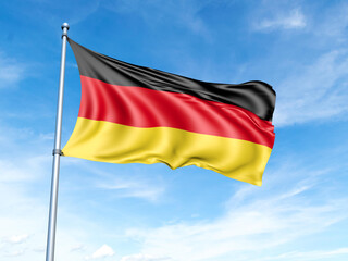 Germany flag on a pole against a blue sky background.
