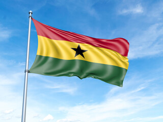 Ghana flag on a pole against a blue sky background.