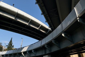 architecture, urban and road concept - view of road junction against the sky